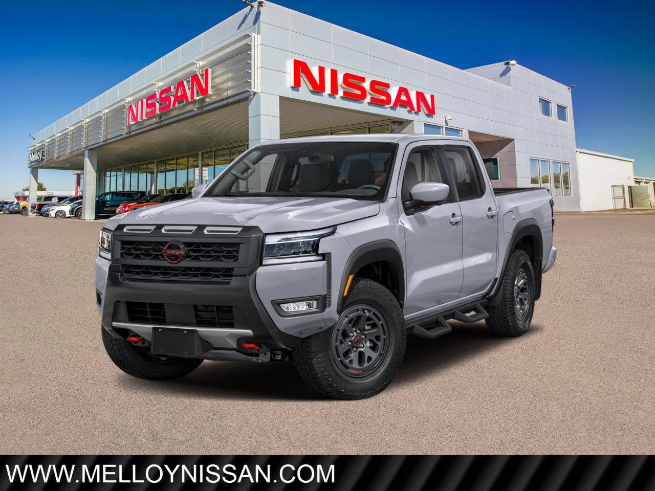 2026 Nissan Frontier Crew Cab 4x4 PRO-4X in Boulder Gray Pearl — front three-quarter view
