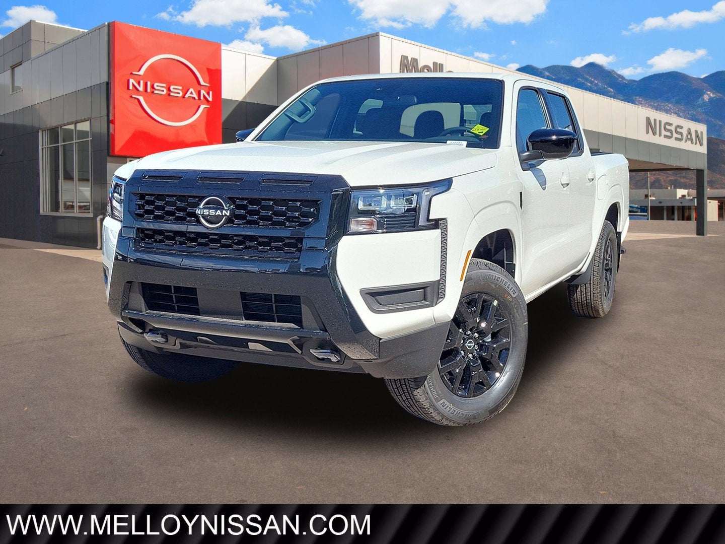 2026 Nissan Frontier Crew Cab 4x4 SV in Glacier White — front three-quarter view