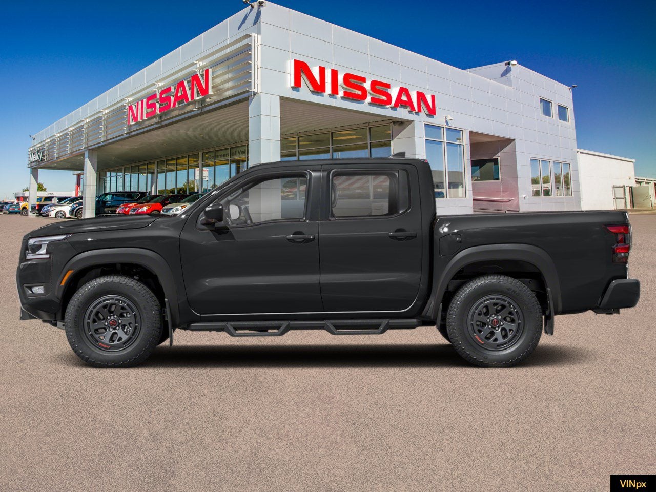 2026 Nissan Frontier — rear three-quarter view