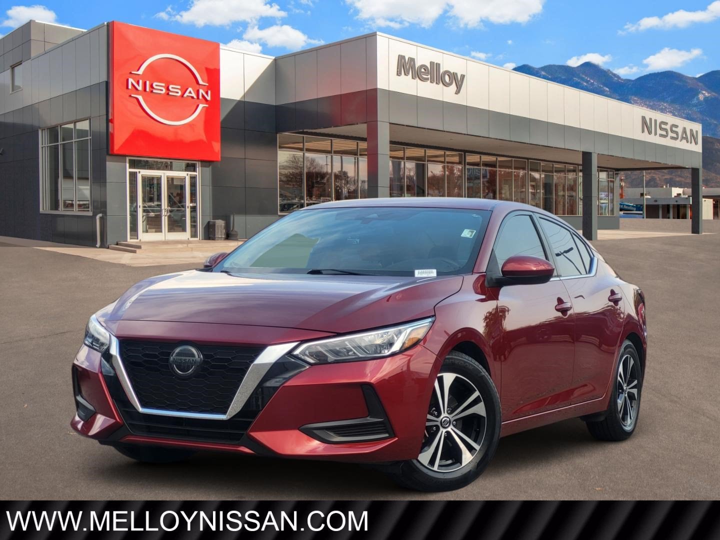 2023 Nissan Sentra SV in Scarlet Ember Tintcoat — front three-quarter view