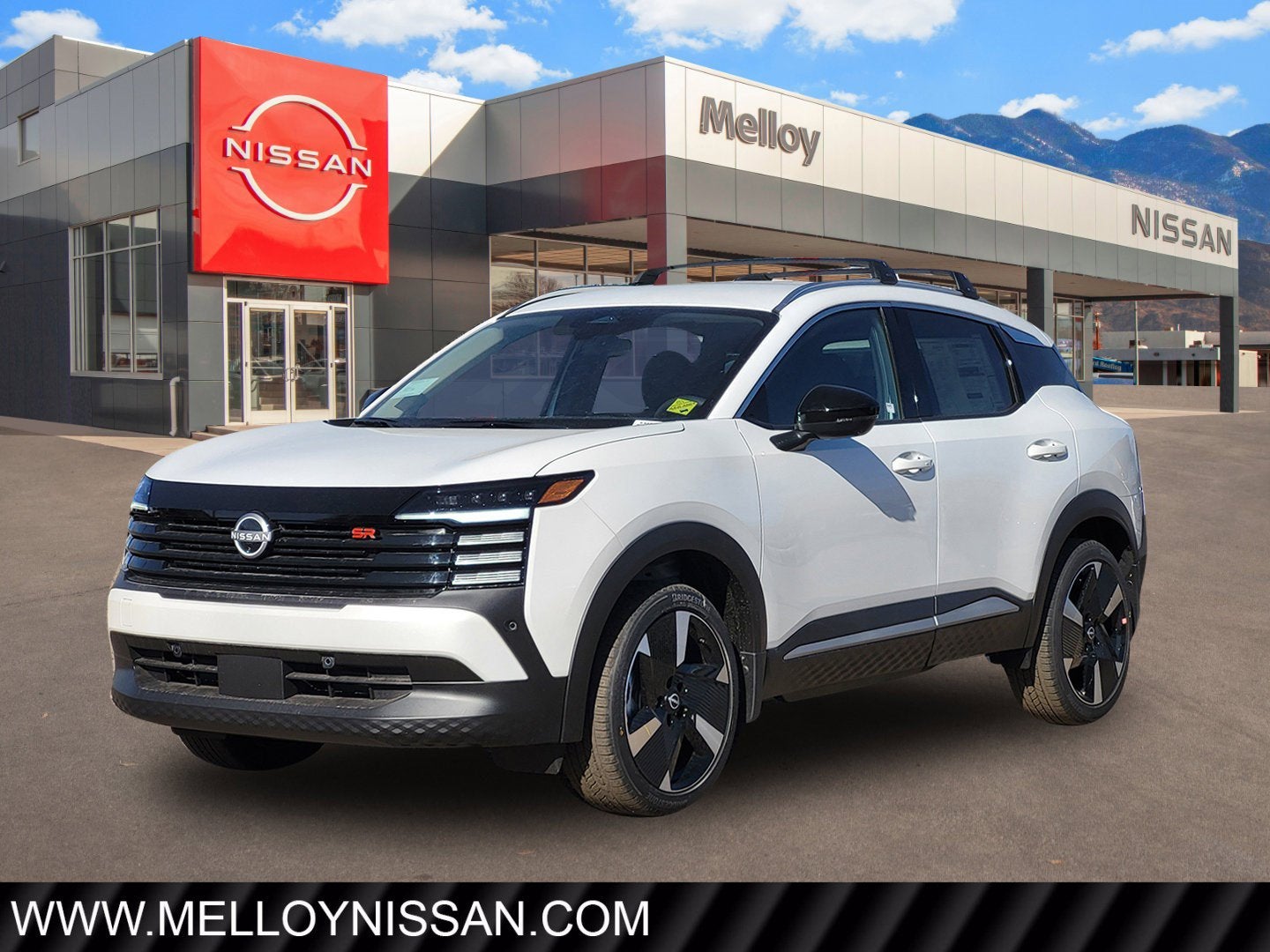2026 Nissan Kicks SR AWD in Aspen White Tricoat — front three-quarter view