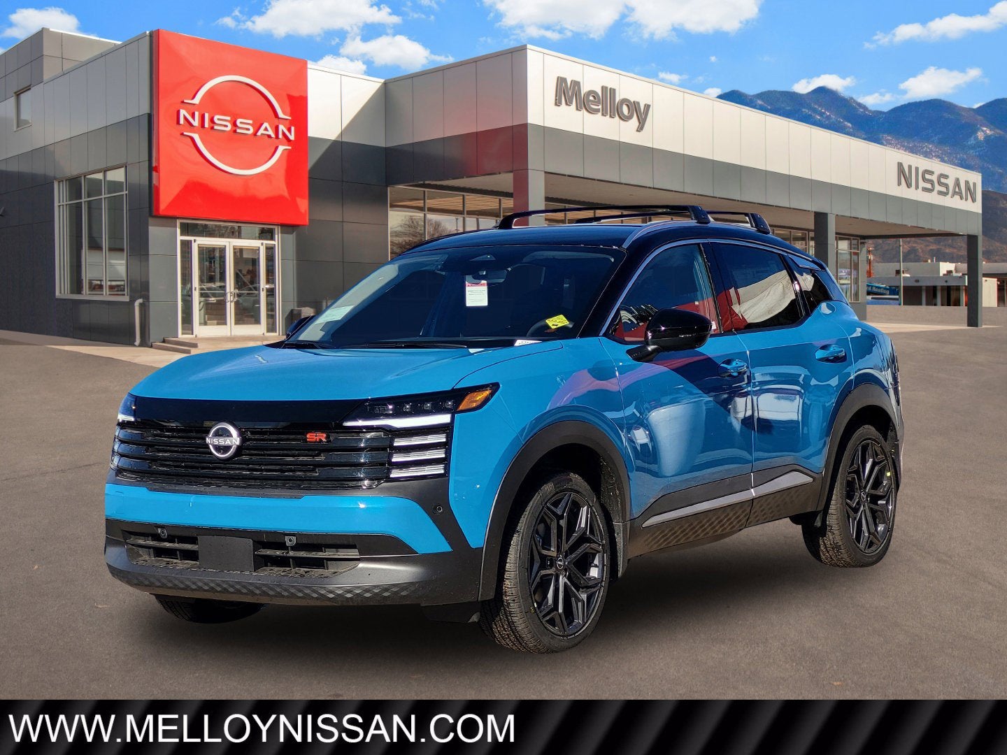2026 Nissan Kicks SR AWD in Arctic Ice Blue Metallic/Super Black — front three-quarter view