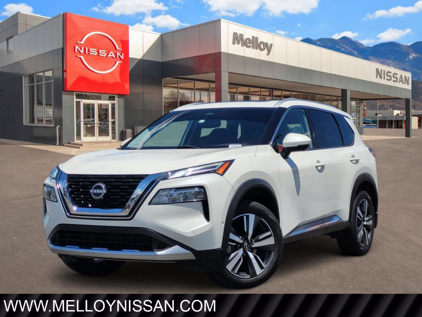 2023 Nissan Rogue Platinum in Pearl White Tricoat — front three-quarter view